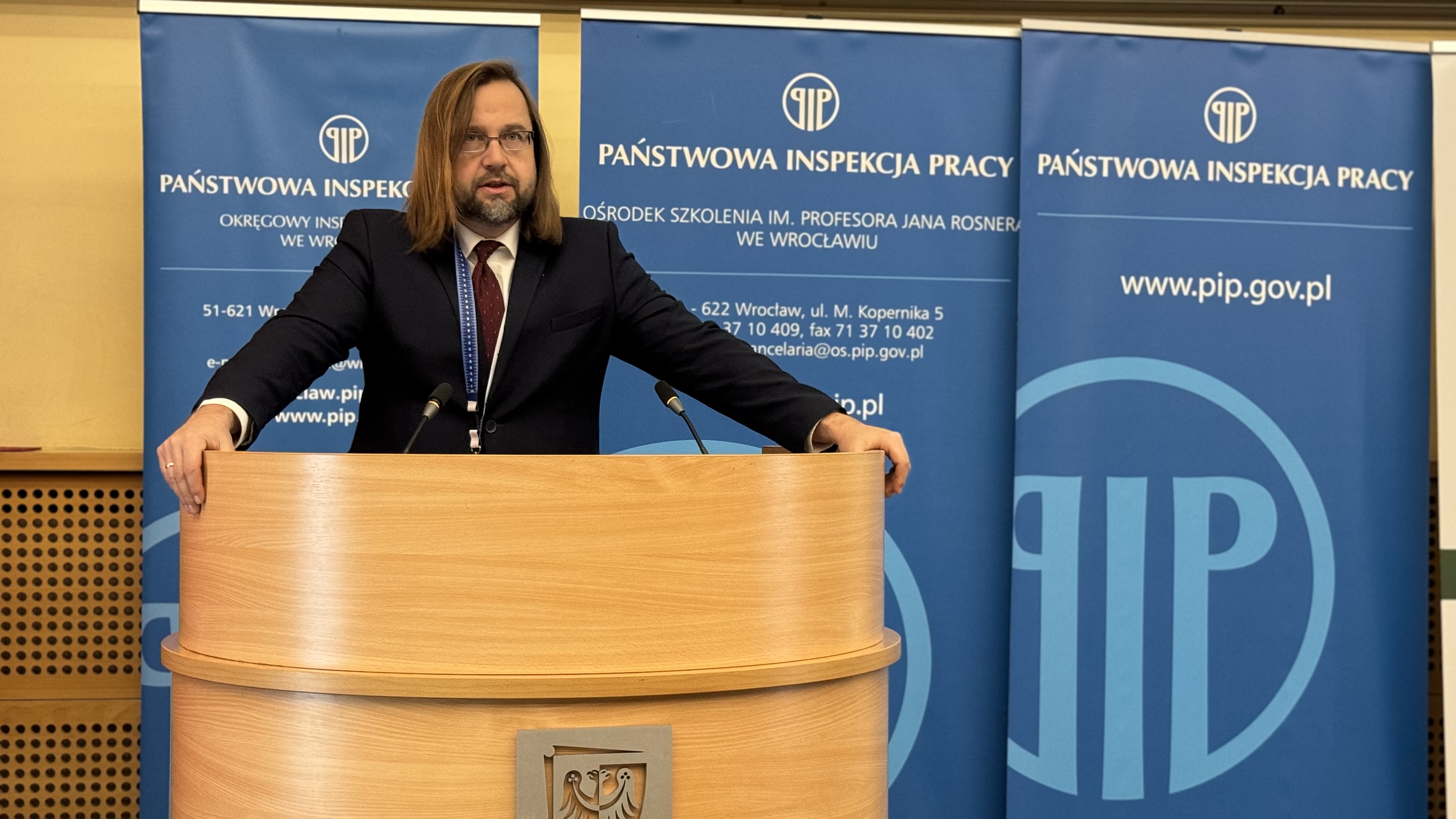 Główny Inspektor Pracy Marcin Stanecki podczas wystąpienia